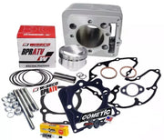 An assortment of motorcycle engine parts including a piston, piston rings, wrist pin, circlips, gaskets, and a cylinder head stud kit, with branding visible on the packaging such as Wiseco and Cometic.
